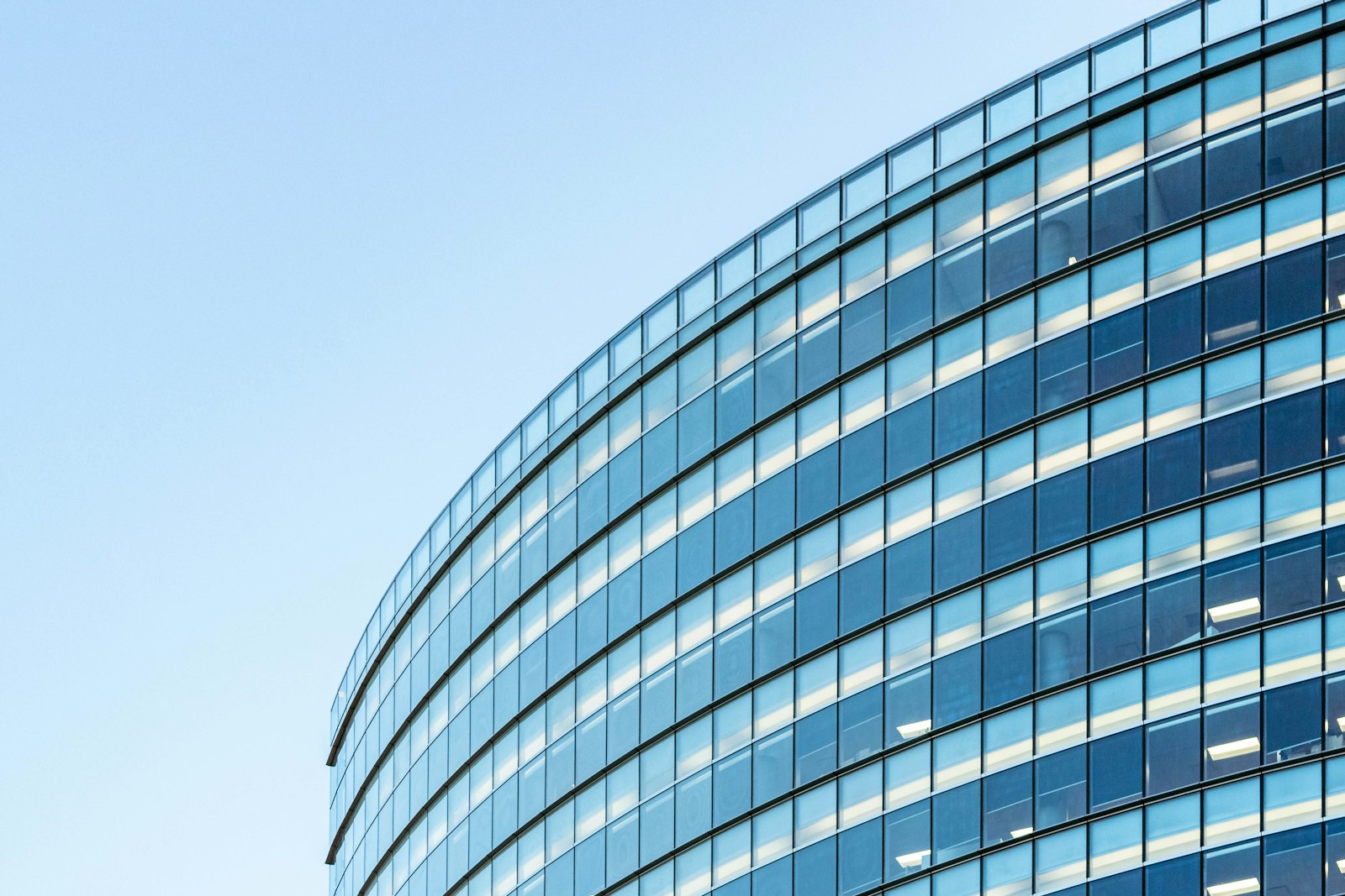 Modern mid-rise commercial building with a glass facade