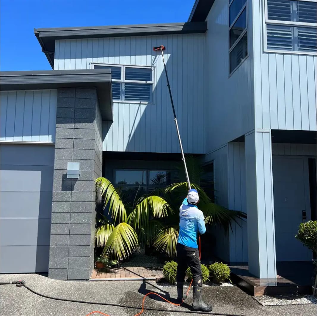 Soft wash low-pressure technique applied to a South Florida tile roof